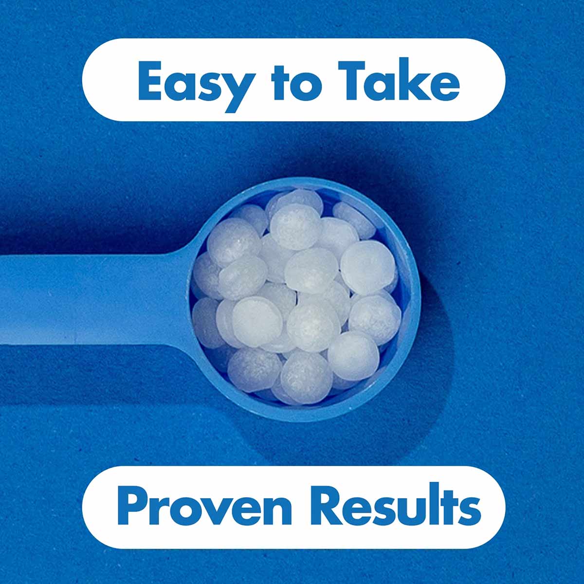 White monolaurin pellets in a blue measuring scoop against a blue background.