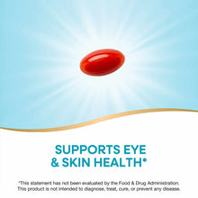 Red oval softgel capsule displayed against a blue sky background with light rays.