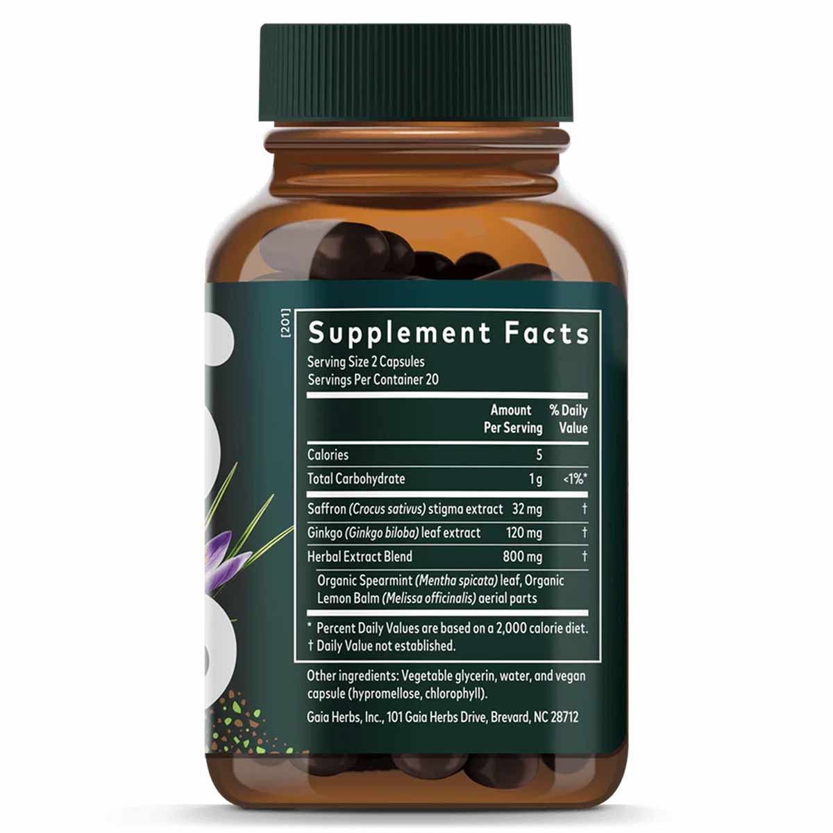 Amber glass bottle with green cap containing dark capsules and supplement facts label displaying ingredients including saffro