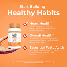 Bottle of MaryRuth's Omega 3-6-7-9 gummies in peach, mango, and apricot flavor held in hand against orange background.