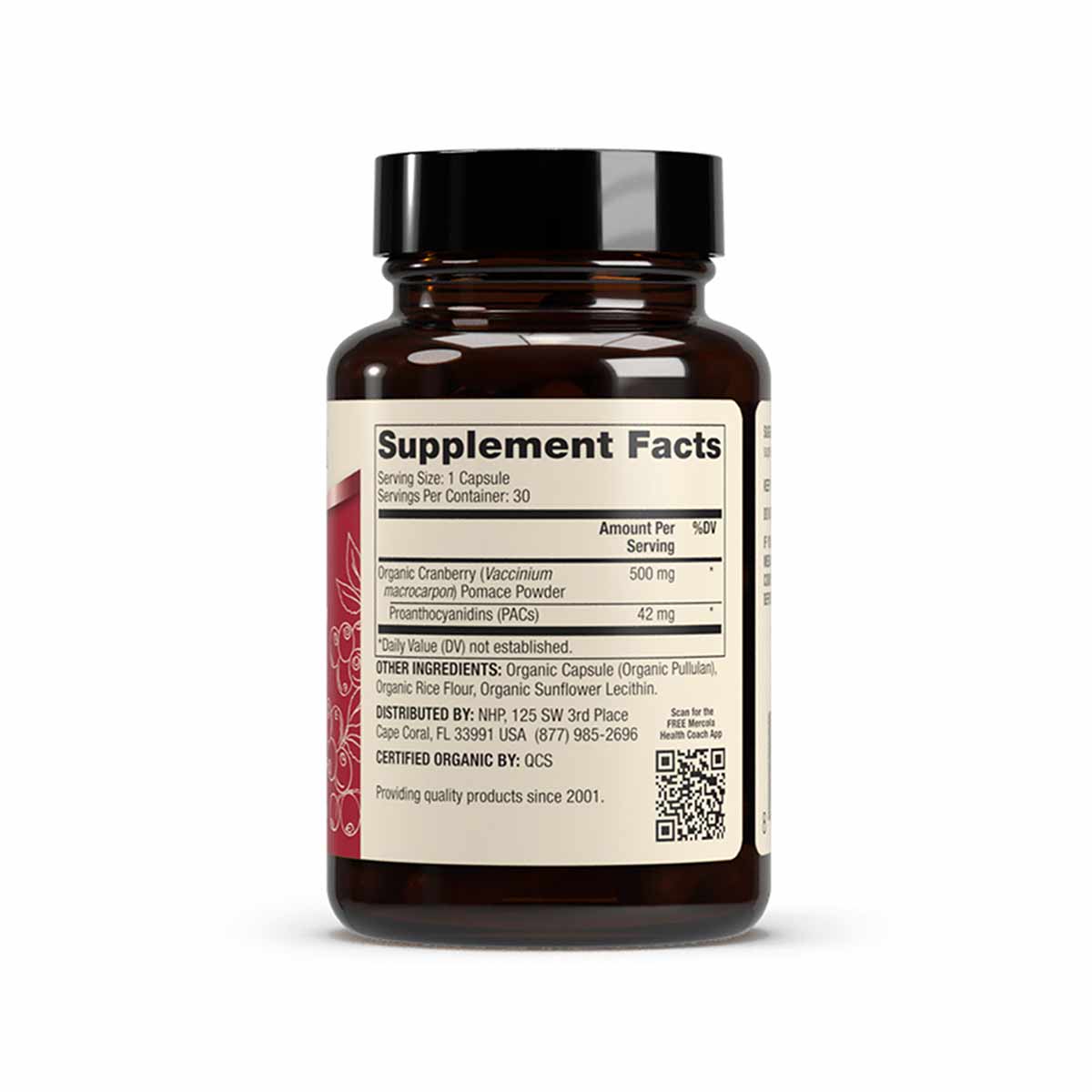 Dark amber glass bottle with black cap containing organic cranberry supplement capsules and PACs.