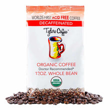 Tylers Coffee 12 oz bag of organic decaf whole bean coffee with USDA organic seal and roasted beans displayed below.