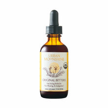 Dark glass dropper bottle with white and yellow label reading "Urban Moonshine Original Bitters," 2 fl oz herbal supplement.