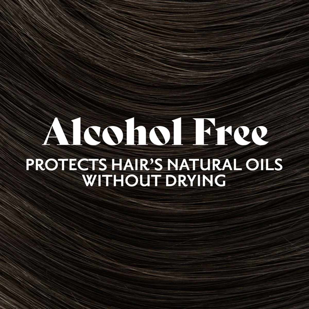 Close-up of dark brunette hair with glossy finish and visible texture.