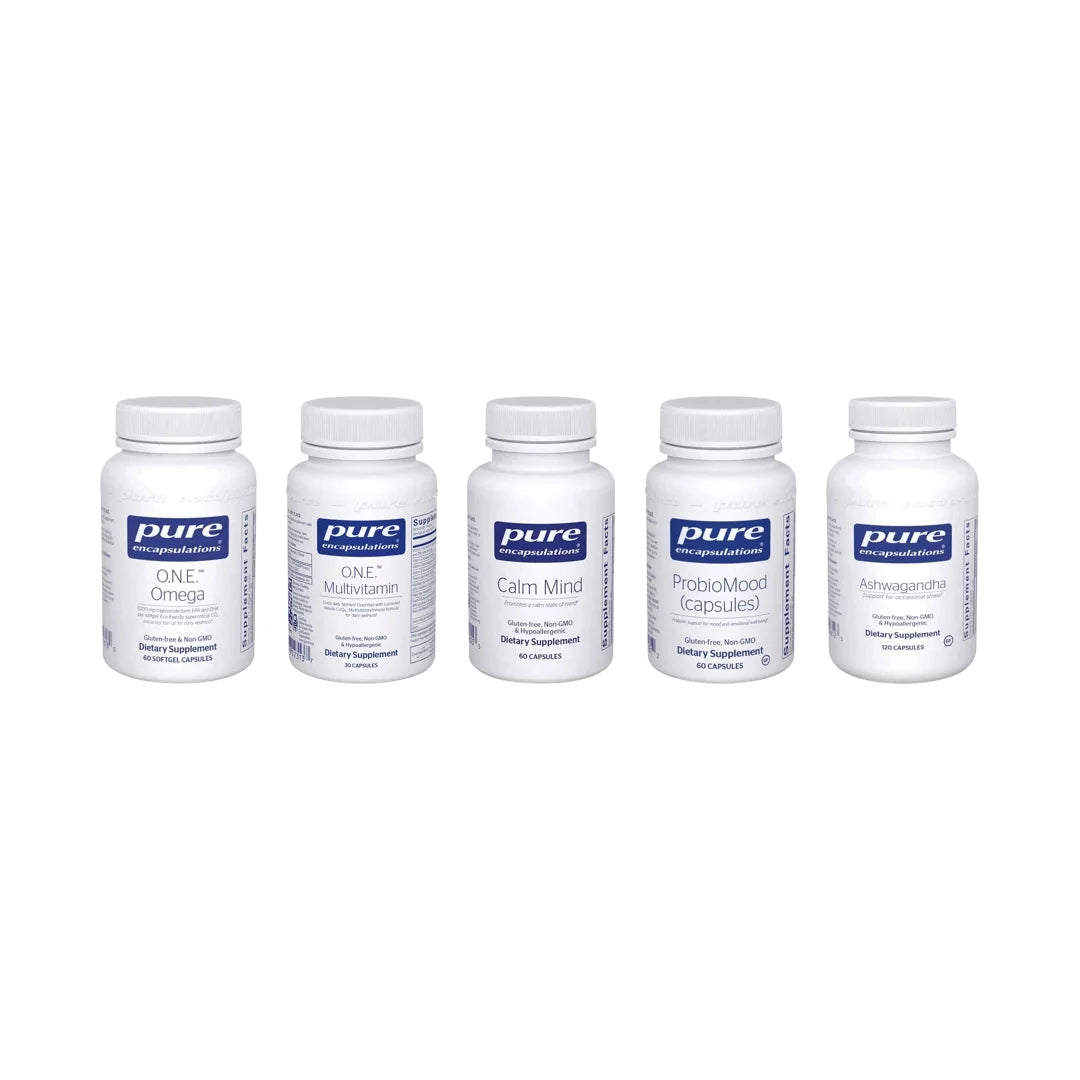 Five white Pure Encapsulations supplement bottles labeled ONE Omega, ONE Multivitamin, Calm Mind, ProbioMood, and Ashwagandha
