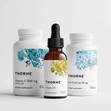 Three Thorne Research dietary supplement bottles: Vitamin C 500 mg capsules, Vitamin D3 liquid dropper, and Zinc Picolinate 3