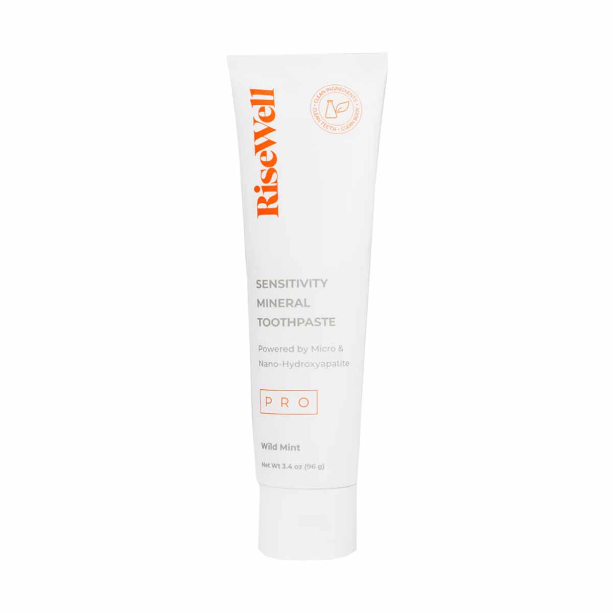 White tube of RiseWell Sensitivity Mineral Toothpaste with orange branding and PRO label, 3.4 oz size.