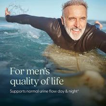 Older man in dark wet shirt splashing in ocean waves with text about men's quality of life and urine flow support.