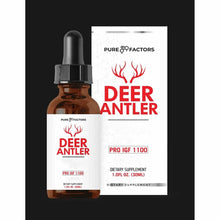 Brown glass dropper bottle with black cap and white label featuring red deer antler graphic, displayed next to white product 