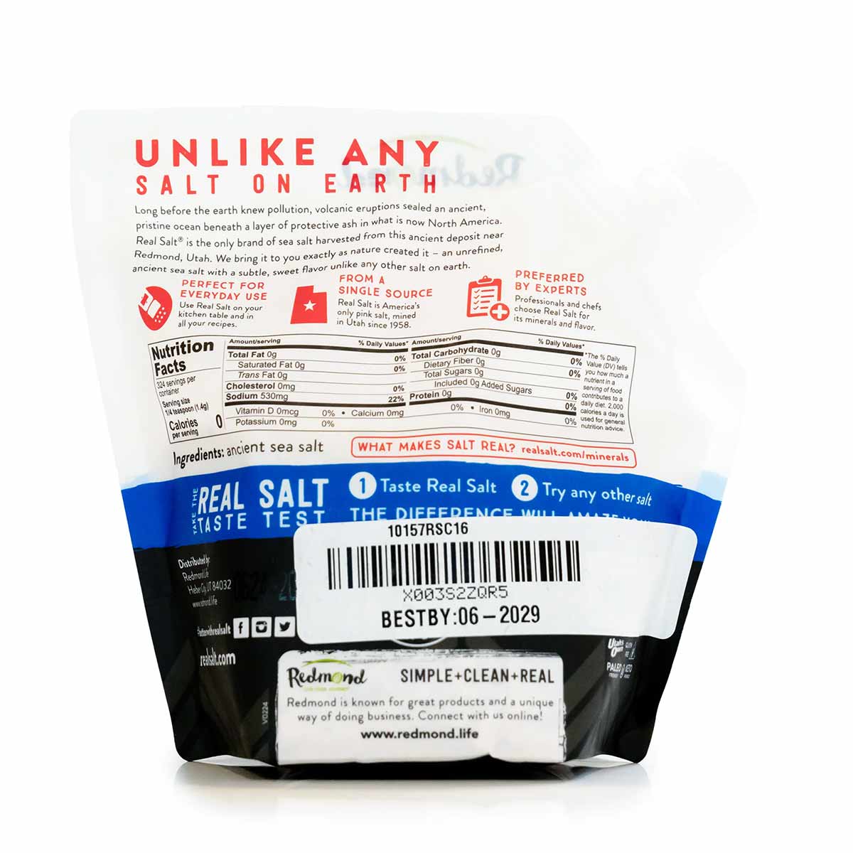 White and black pouch of Real Salt coarse sea salt by Redmond Life with nutrition facts and product information visible on fr