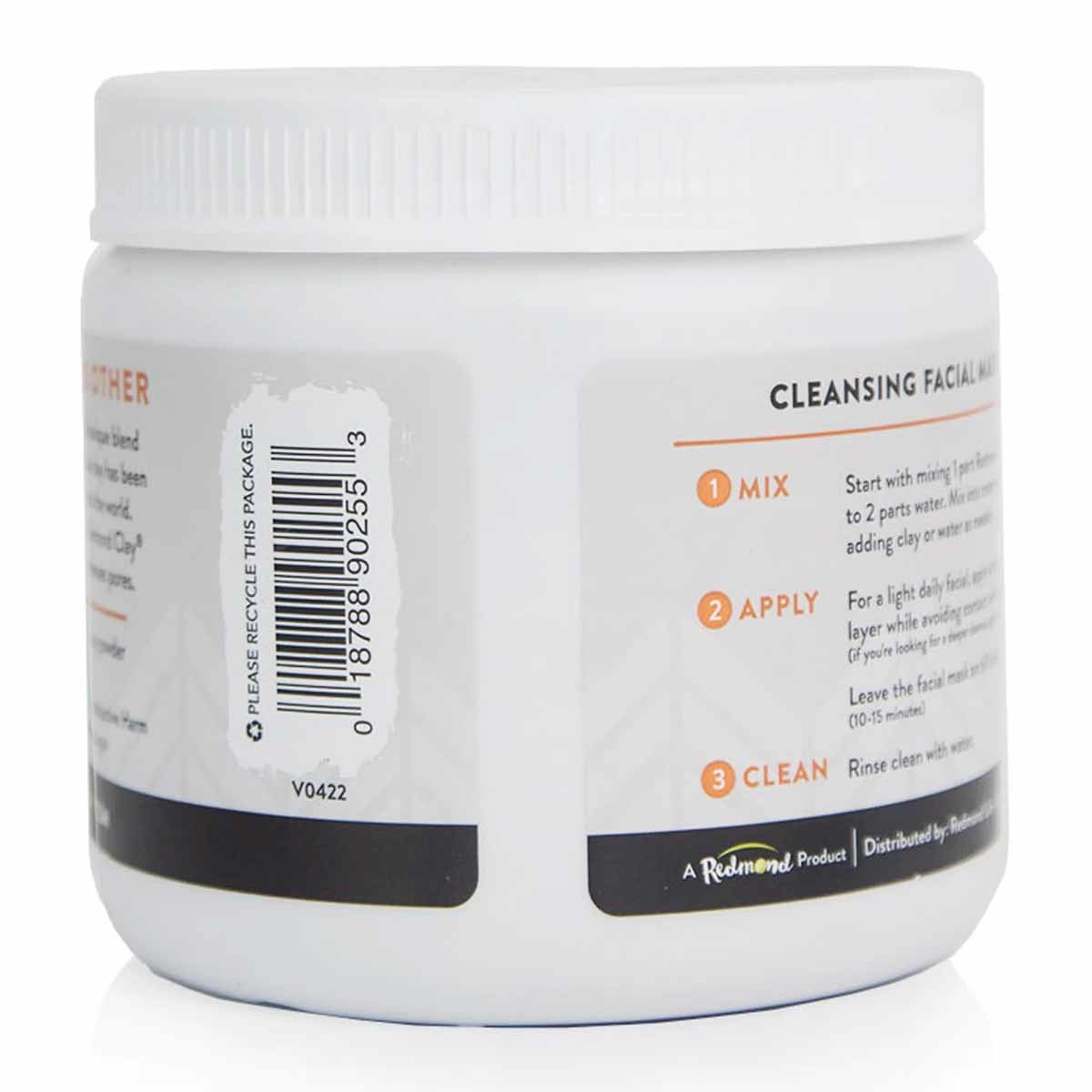 White plastic jar with white screw-top lid containing bentonite clay powder, labeled with usage instructions and Redmond bran