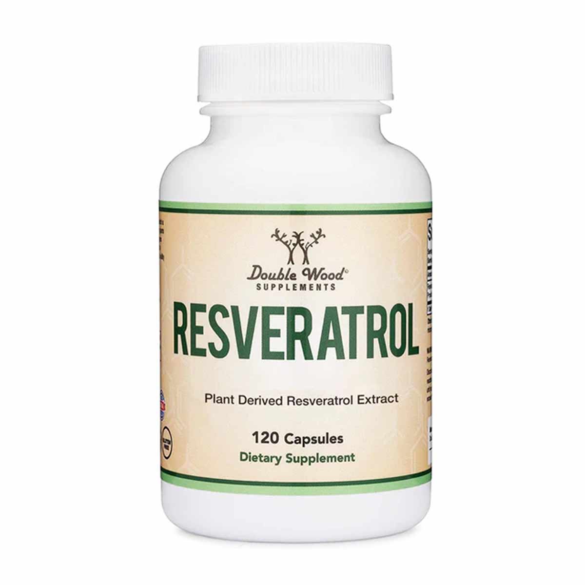 White bottle with green and tan label containing 120 capsules of Double Wood Supplements Resveratrol extract.