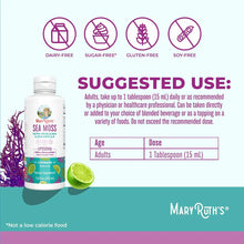 Bottle of MaryRuth's Sea Moss with Spirulina and Chlorella liquid supplement with lime slice and purple seaweed decoration.