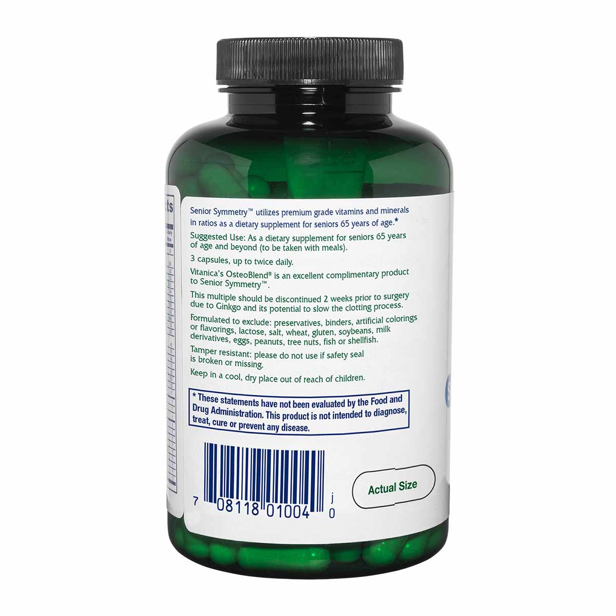 A green glass supplement bottle with a black cap shows the back label with usage directions, a barcode, and green capsules inside.