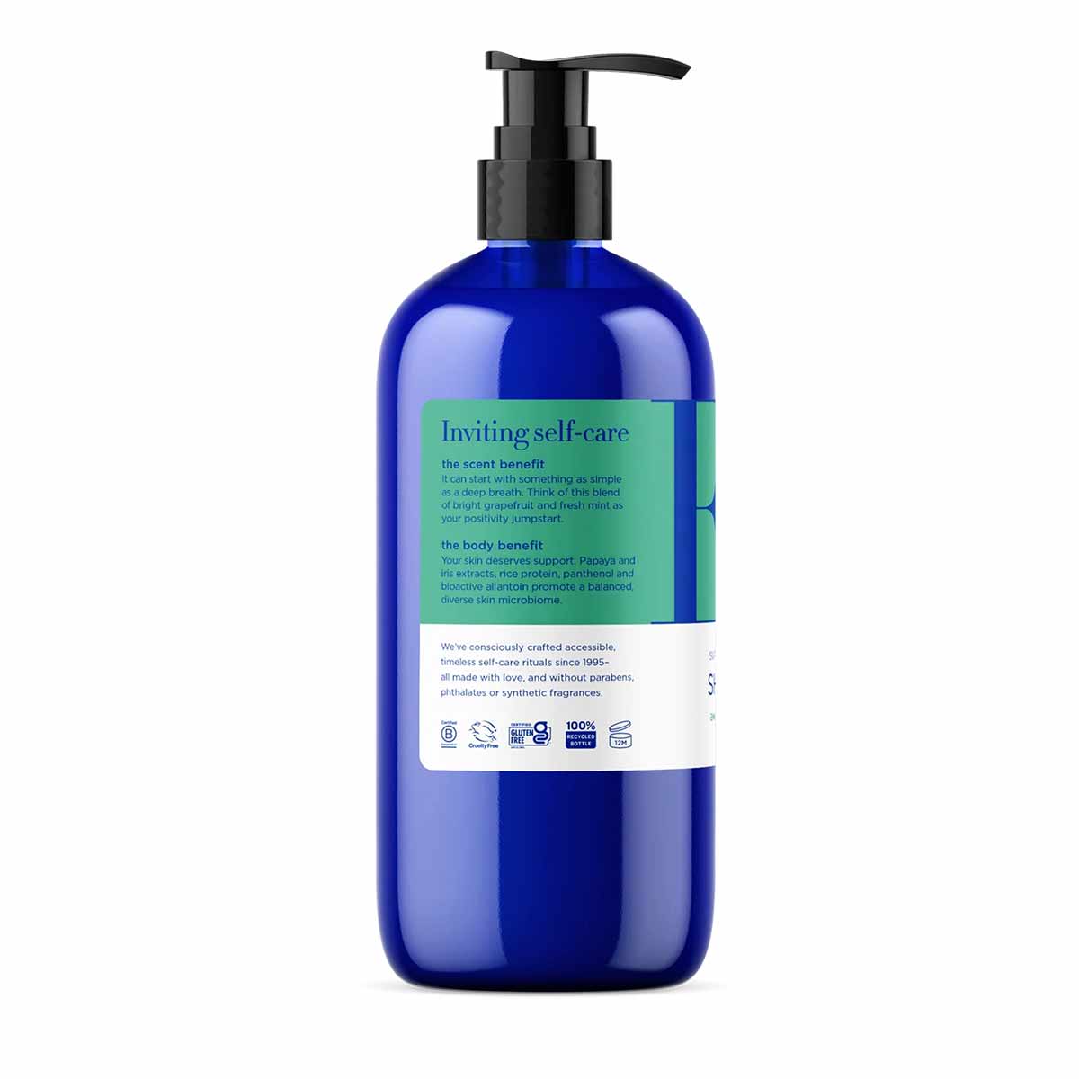 Blue bottle of EO Products shower gel with black pump dispenser and green and white product label.