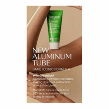 Weleda Skin Food Original Ultra-Rich Cream in green aluminum tube displayed on skin with beige background.