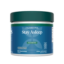 Charlotte's Web Stay Asleep gummies in a white and blue jar with teal lid, labeled as melatonin-free herbal supplement.