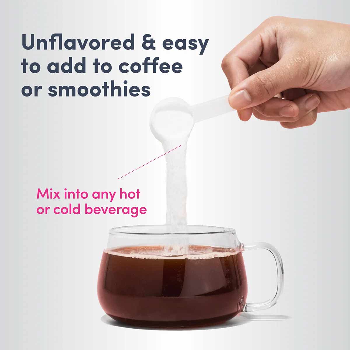 Hand holding white scoop pouring collagen powder into mug of dark coffee.