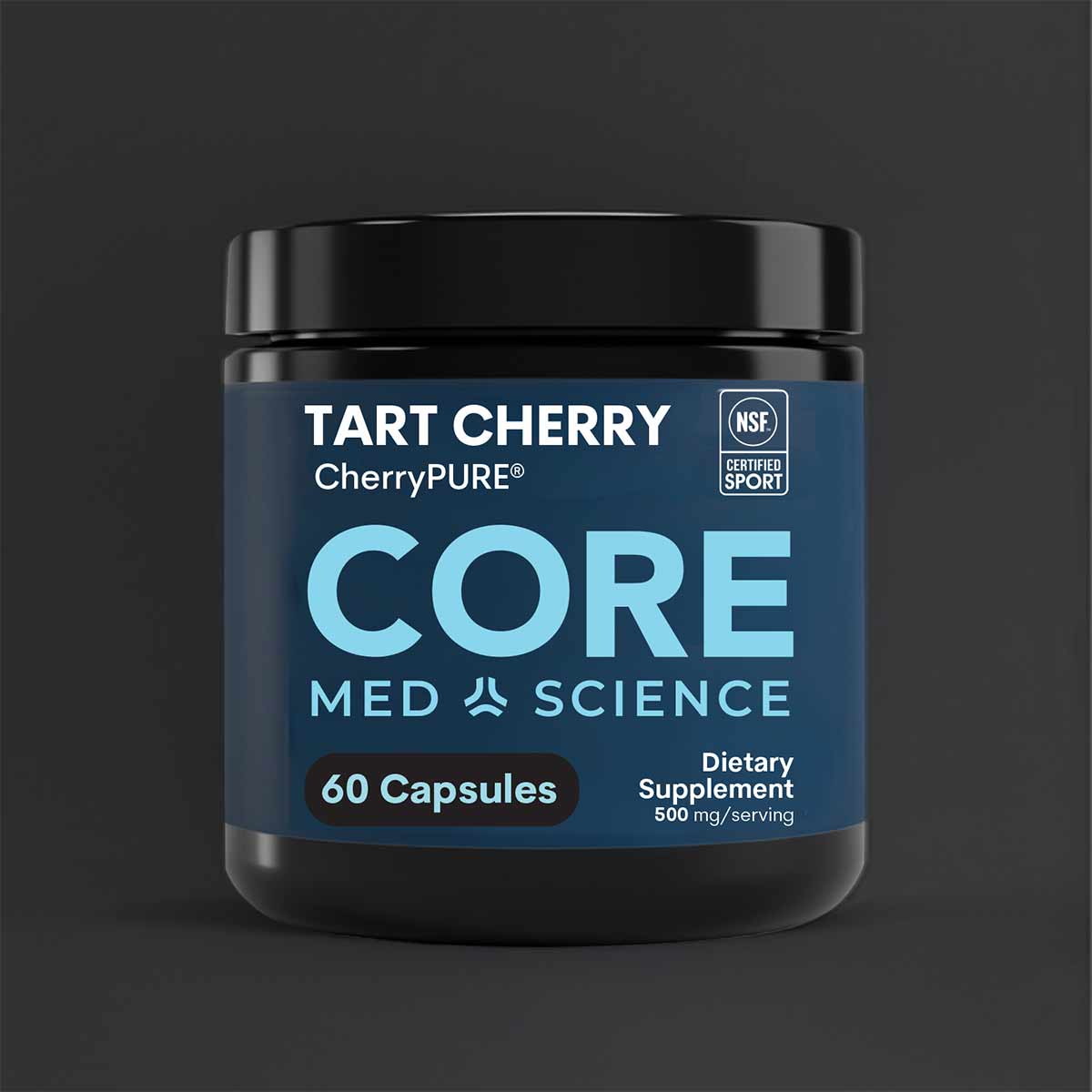 Dark glass jar with black lid containing Core Med Science Tart Cherry capsules, labeled 60 capsules, 500 mg per serving.