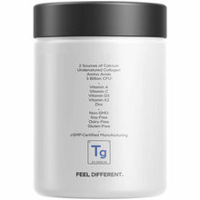 White cylindrical supplement jar with dark gray lid, displaying ingredient list and nutritional information for a dental heal