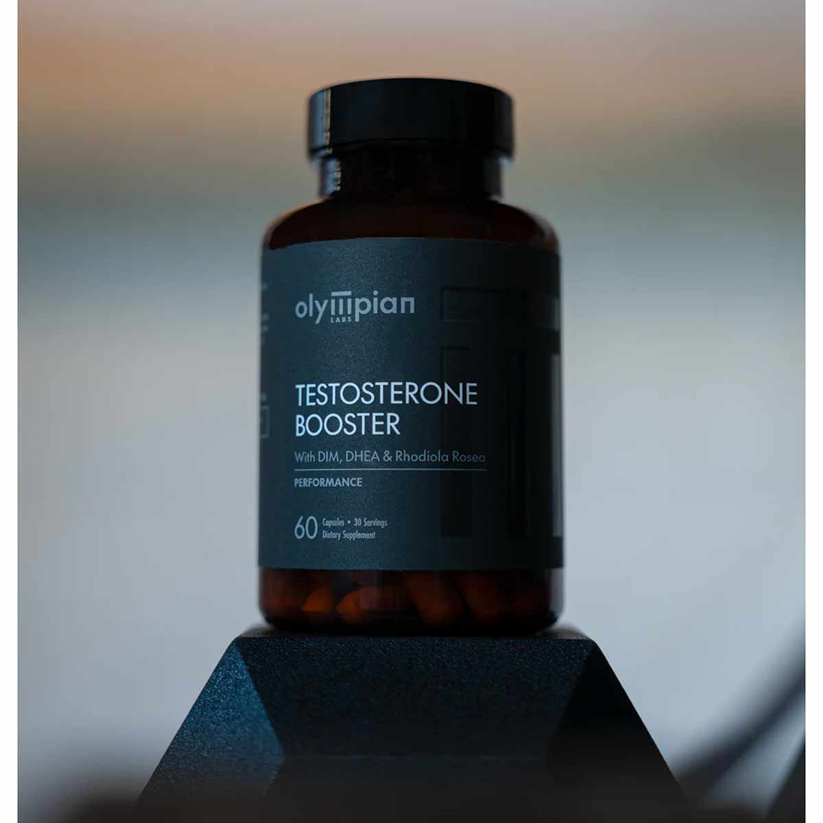 Olympian Labs Testosterone Booster bottle with dark label containing 60 capsules and black screw-top cap.