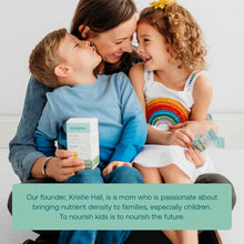 Woman holding probiotic supplement box with two children, one holding individual stick packs.