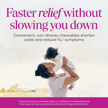 Adult holding young child outdoors with text about cold and flu chewables above.
