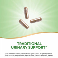 Three brown herbal supplement capsules on a green and white background.