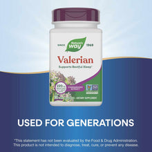 White bottle with purple cap containing Nature's Way Valerian supplement, 90 vegan capsules, featuring purple flowers and pro