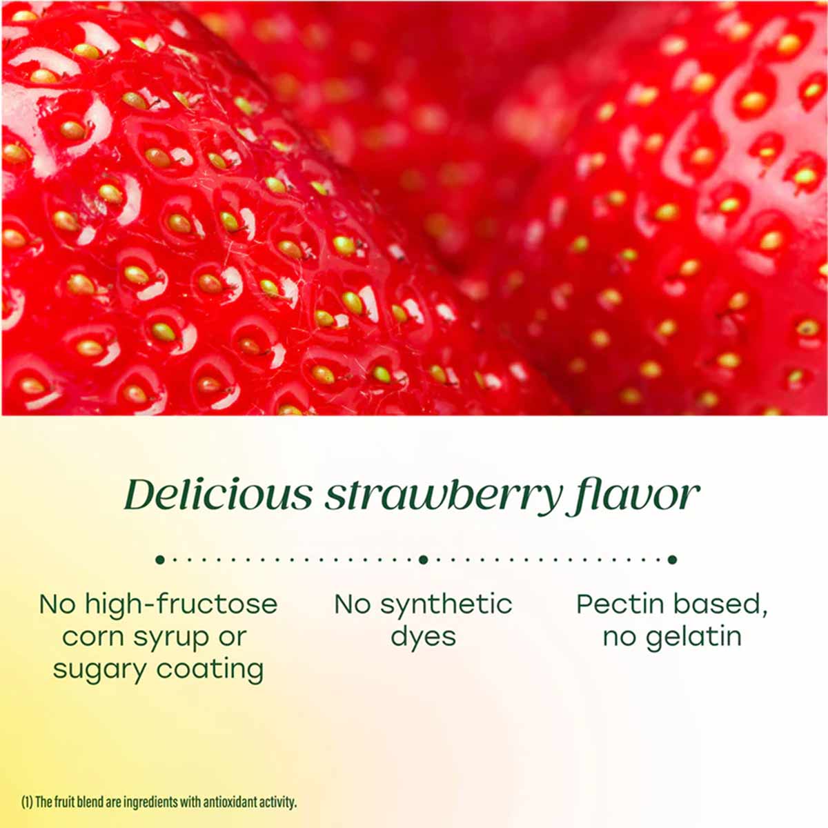 Close-up of red strawberry with yellow seeds, representing strawberry-flavored gummy supplement.