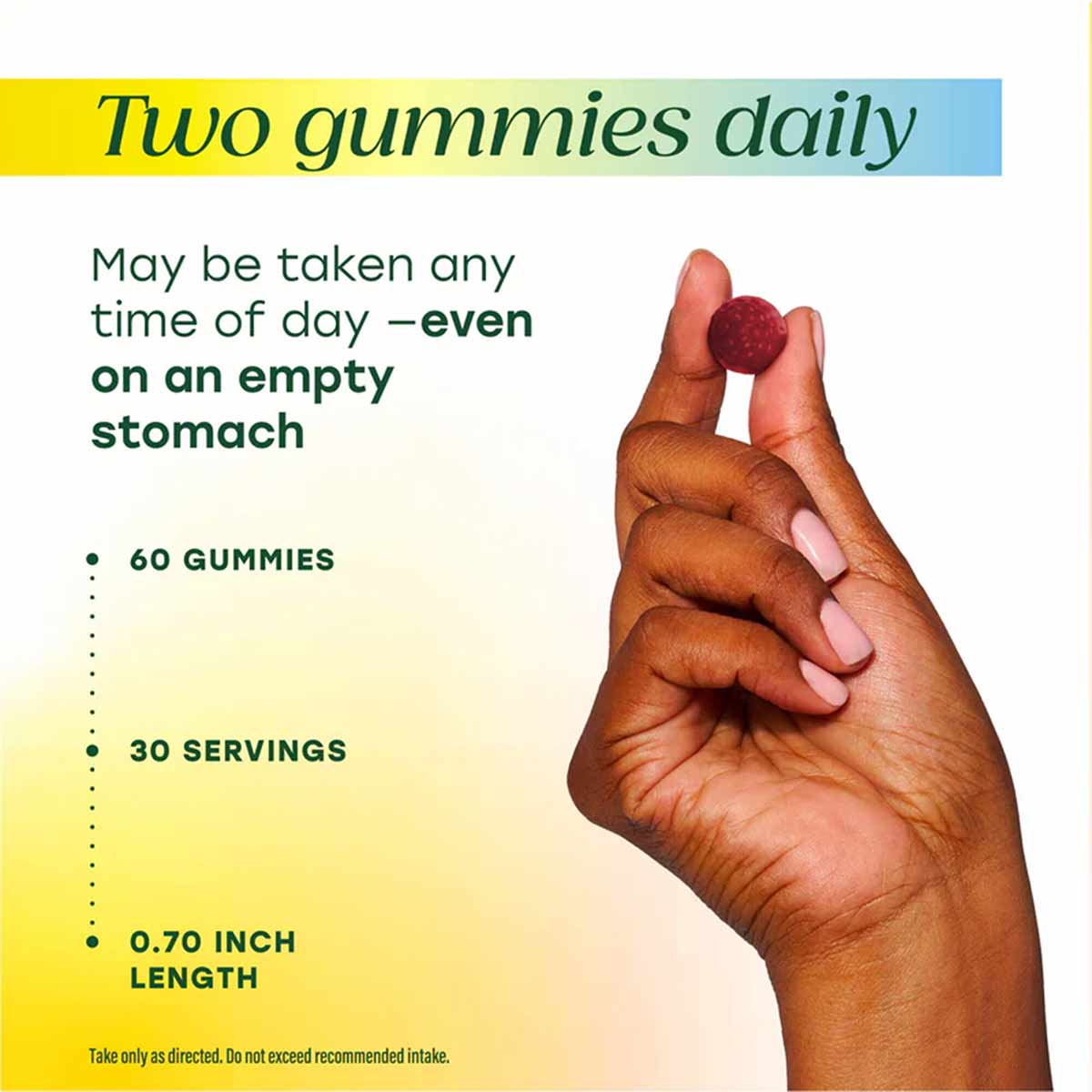 Hand holding red and pink probiotic and prebiotic gummies, 60 count bottle with dosage and usage information.
